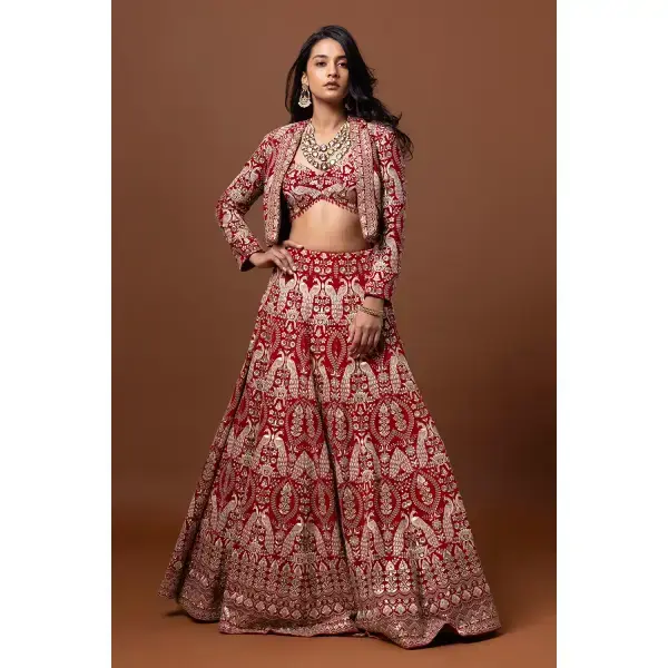 SEASONS-RED CLASSIC BRIDAL LEHENGA SET WITH ALL OVER PATTERNED THREAD WORK PAIRED WITH A MATCHING CROPPED JACKET AND SEQUIN DETAILS.
